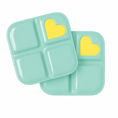 Two light blue divided plates containing Glutathione Troche yellow heart design.