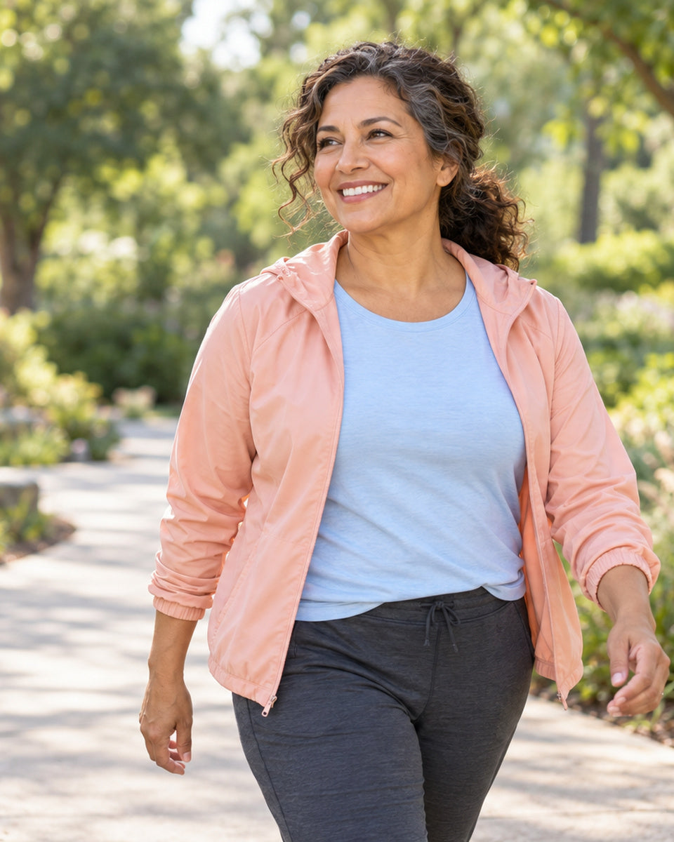 Smiling woman in a sports jacket outdoors